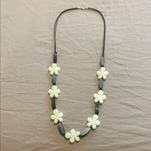 Elegant Floral Necklace with Cream and Black Accents